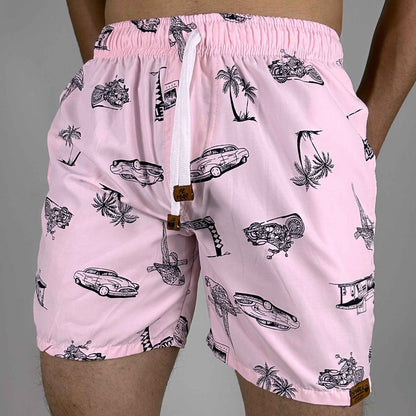 Pantaloneta de hombre estampado retro y playero en fondo rosa